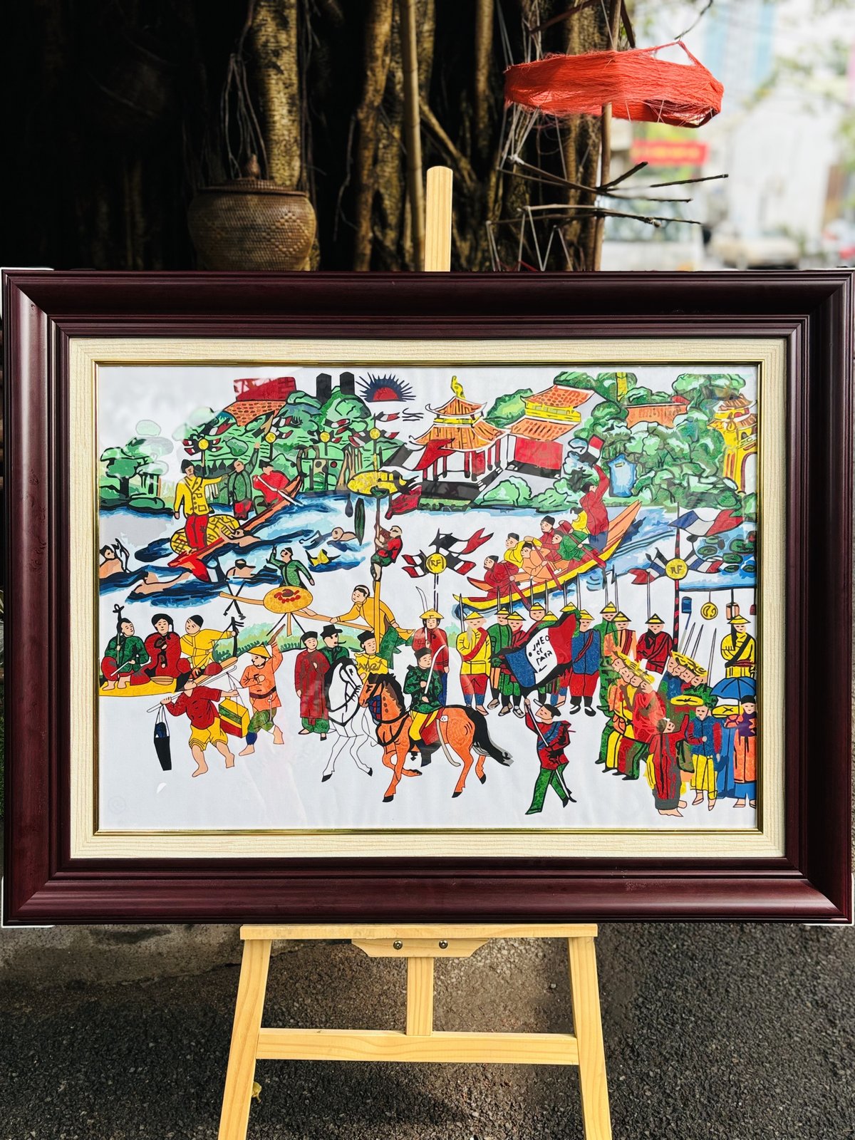 Upcycled Silk Art Picture with a hand-pieced village river festival design
