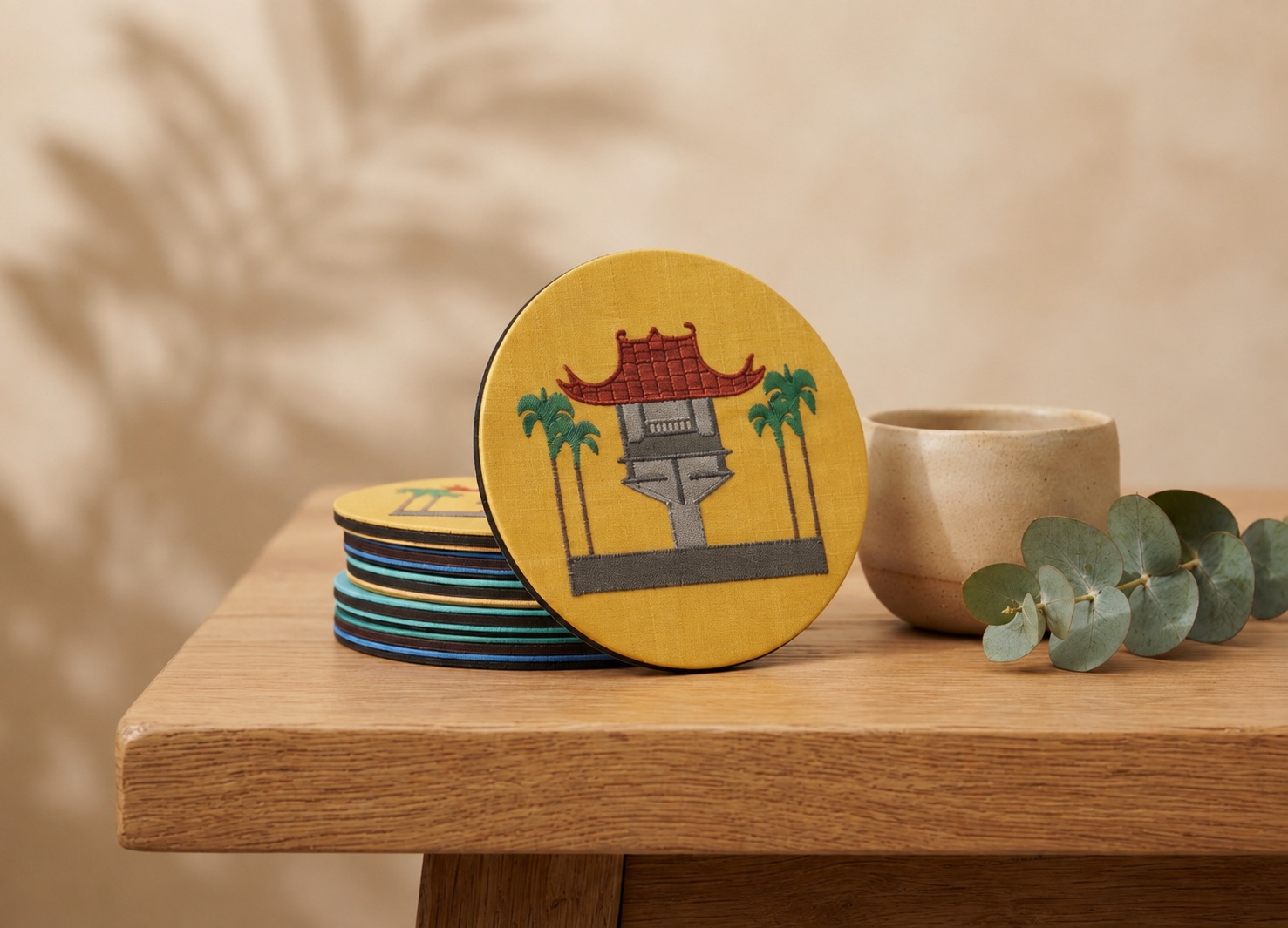Upcycled Silk Coaster with a hand-pieced temple gate design