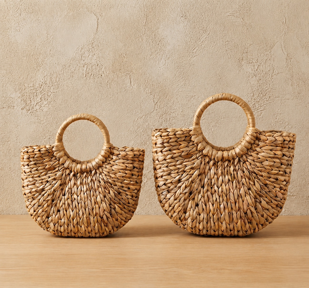 Water Hyacinth Handbag shown in S and M sizes side by side